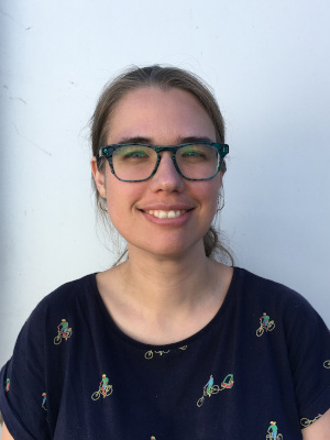 smiling person with glasses